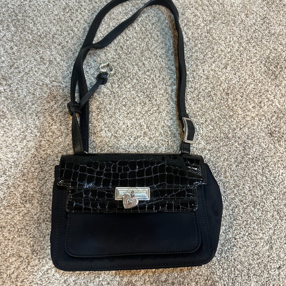 Black leather crossbody bag with silver hardware